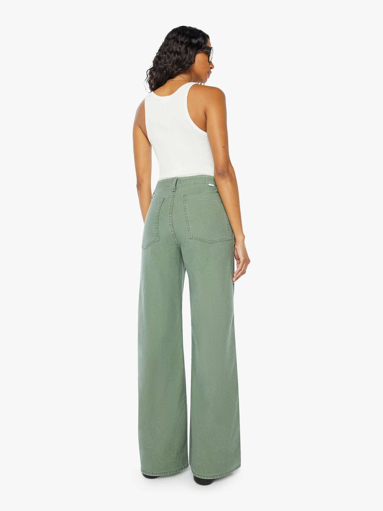 Back view of a womens army green pant featuring a high rise, a wide leg, and a long inseam with clean hem.