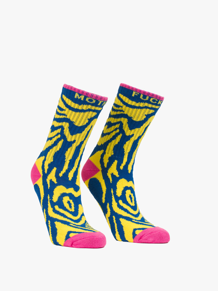 Front view of classic tube socks with an explicit message in a bright yellow and blue zebra print with hot pink details and text in yellow.