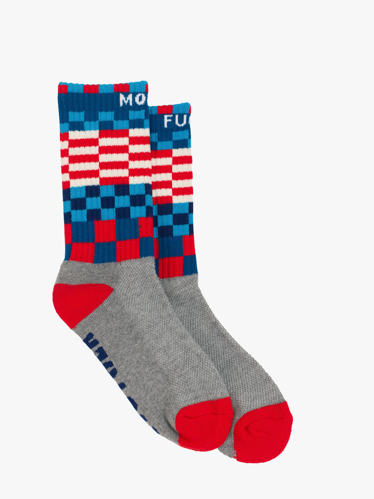 Flat side angle Classic tube socks with subtle message in grey with text and checker print details in shade of blue, white, and red.