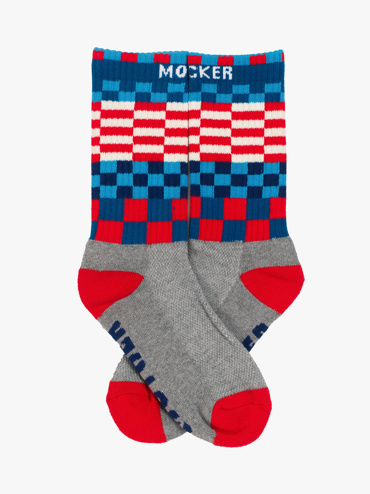 Flat Classic tube socks with subtle message in grey with text and checker print details in shade of blue, white, and red.