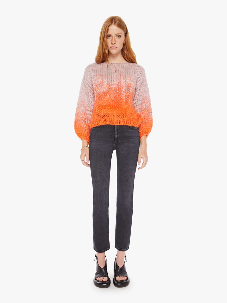 Front full body view women's long sleeve sweater in colors orange and pink.