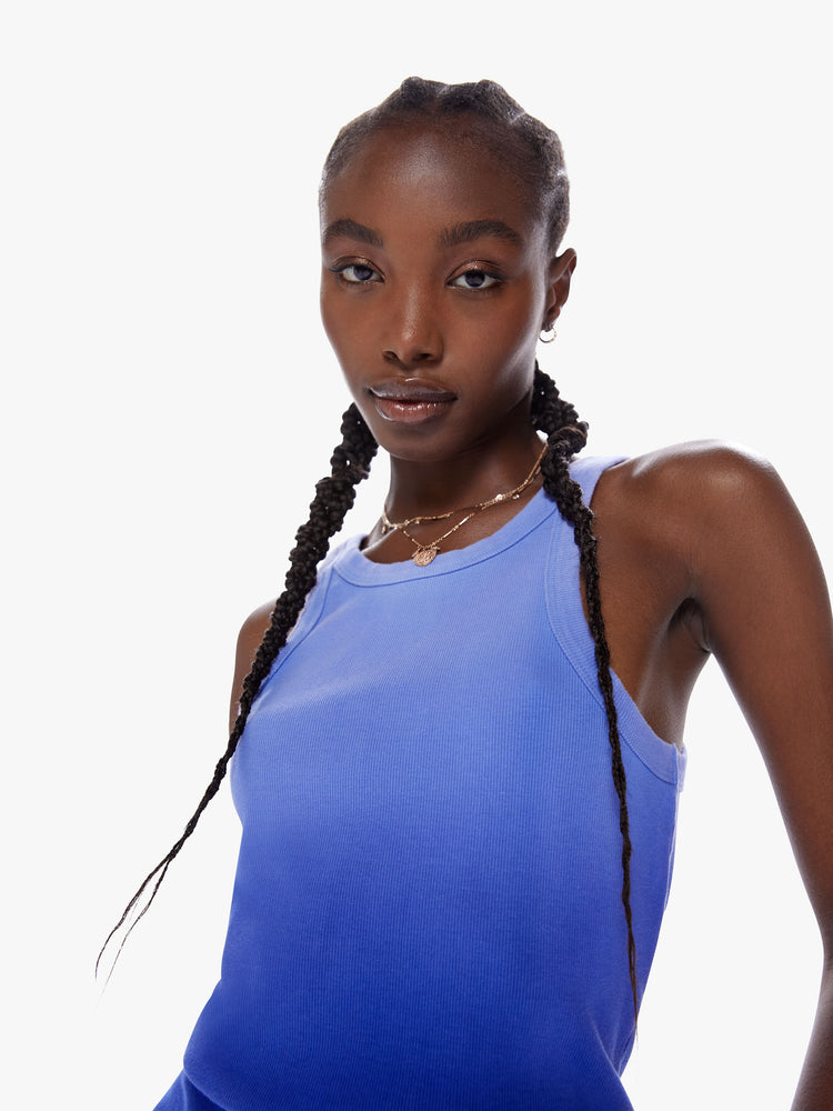 Close up view of a woman dip dyed periwinkle hue Tank features a slim fit and racer-style straps.