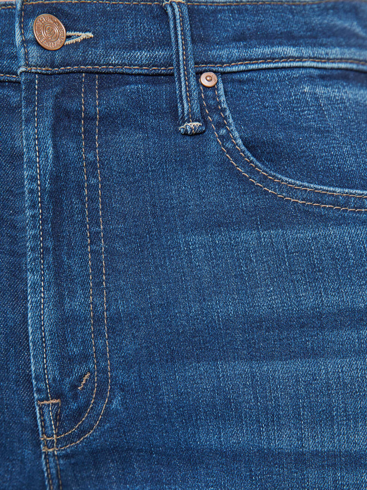 Swatch view of a med blue high-rise straight-leg jean with a zip fly, 32-inch inseam and a clean hem.