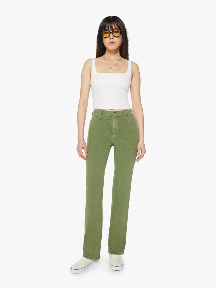 Front view of a woman high-rise, straight-leg with a 32-inch inseam and a clean hem pant in a stone green color.