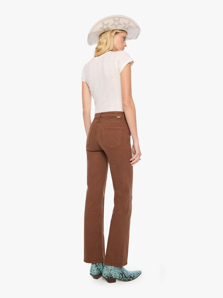 Back view of a woman in a rich brown high-rise straight-leg pant with a zip fly, 32-inch inseam and a clean hem.