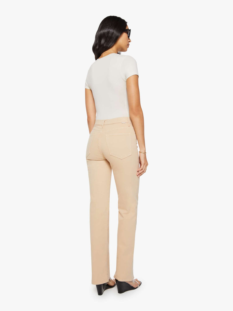 Back view of a woman in a light khaki  high-rise straight leg pant with a zip fly, 32-inch inseam and a clean hem. 