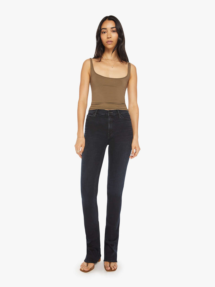 Front view of a woman classic mid-rise bootcut with a long 34-inch inseam and a clean hem in a dark blue wash.