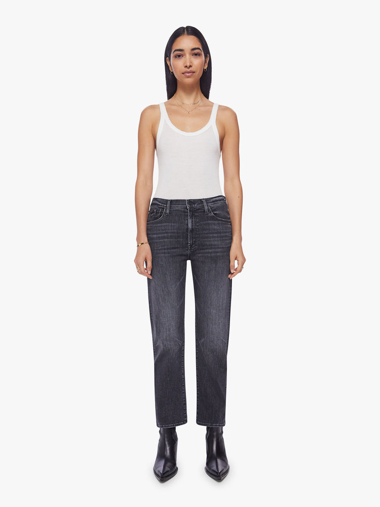 Front view of a woman faded black ankle-length jeans with a zip fly, slouchy straight leg and relaxed fit that's designed to sit on the hips.