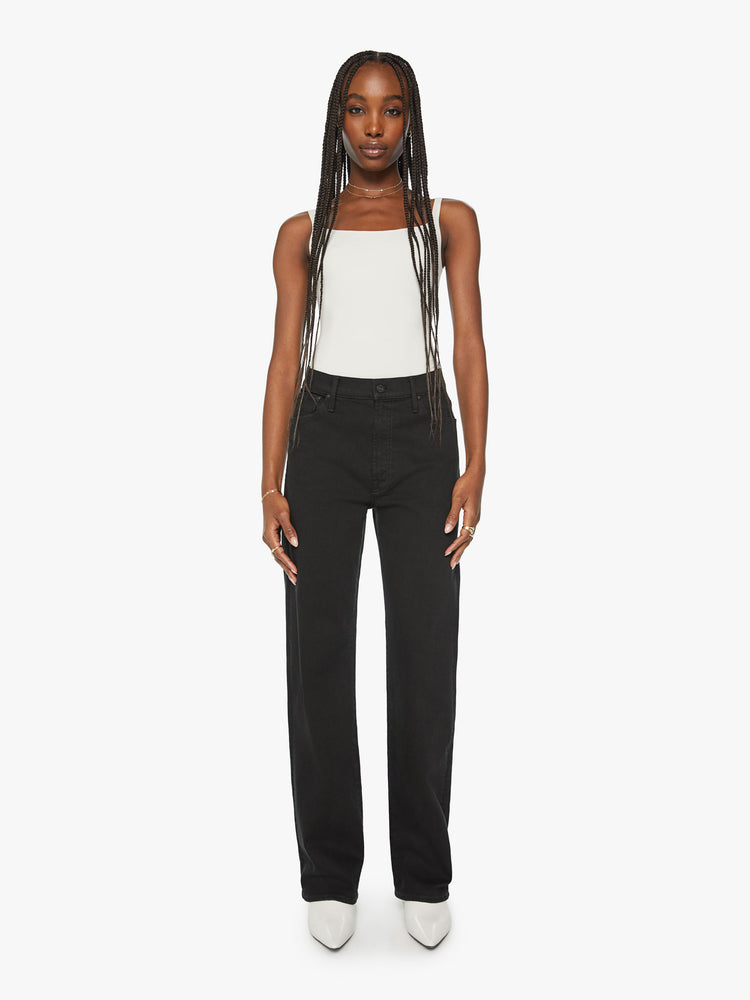 Front view of a woman high waisted jean with a loose wide leg and long 32 inch inseam in a black wash.