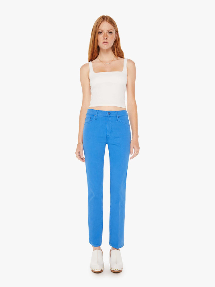 Front view of a woman high-rise bootcut has a 28.25-inch inseam and a clean hem in a bright blue.