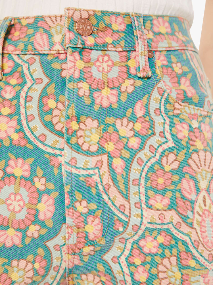 Close up swatch view of a colorful rug inspired print on a pair of pants.