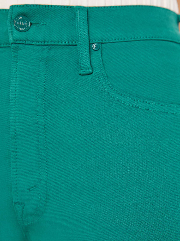 Close up swatch view of green pant.