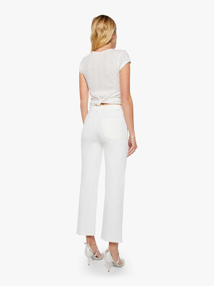 Back view of a womens white high waisted wide straight leg jean with an ankle length inseam and zip fly.