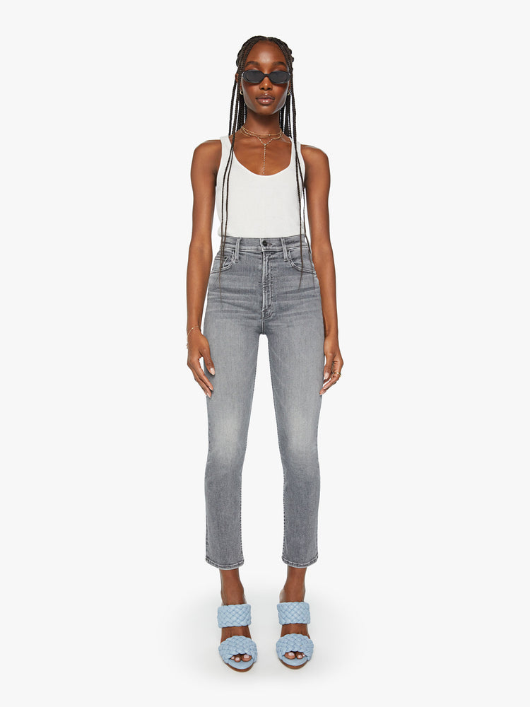 Front view of a woman high-waisted straight leg with an ankle-length inseam and a clean hem in a faded grey wash.