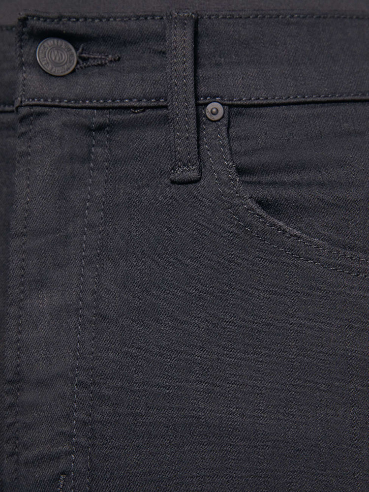 Swatch view of a woman in a black high-waisted straight leg with an ankle-length inseam and a clean hem.