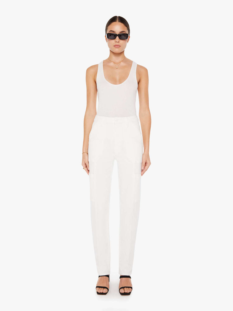 Front view of a womens white cargo pant featuring a super high rise and straight leg.