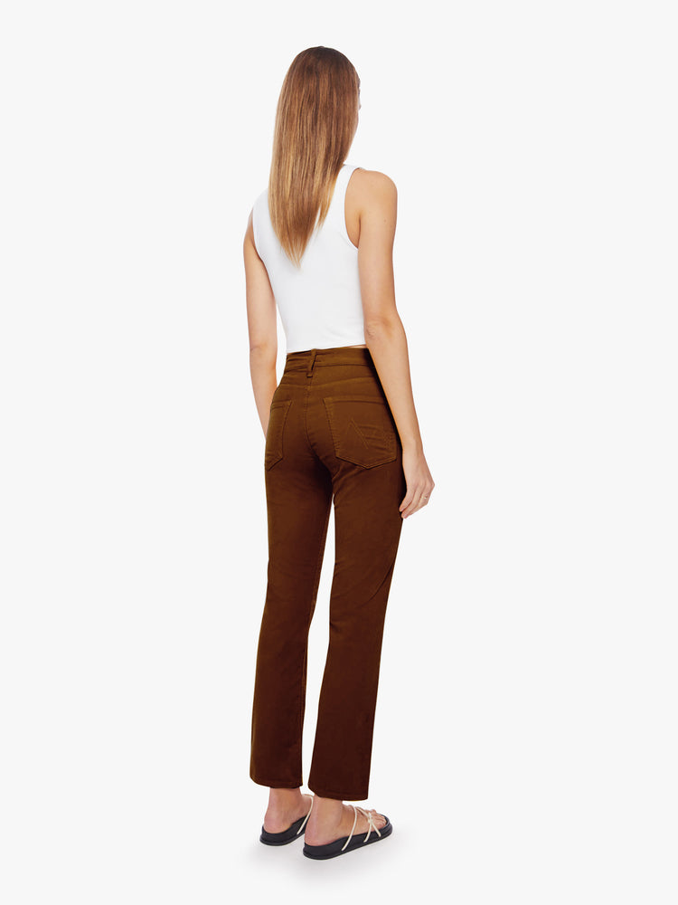 Back view of a woman mid-rise straight leg with an ankle-length inseam and a clean hem in a maroon-brown hue.