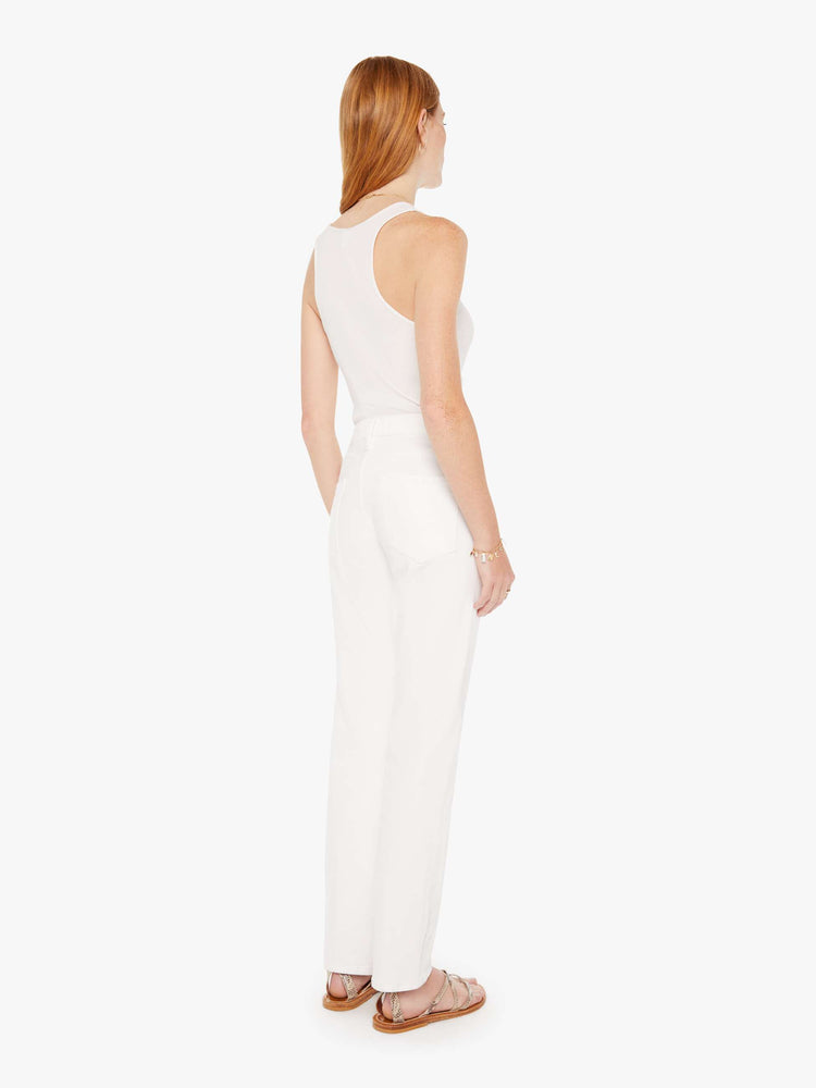 Back view of a womens white denim featuring a high rise and a straight leg.