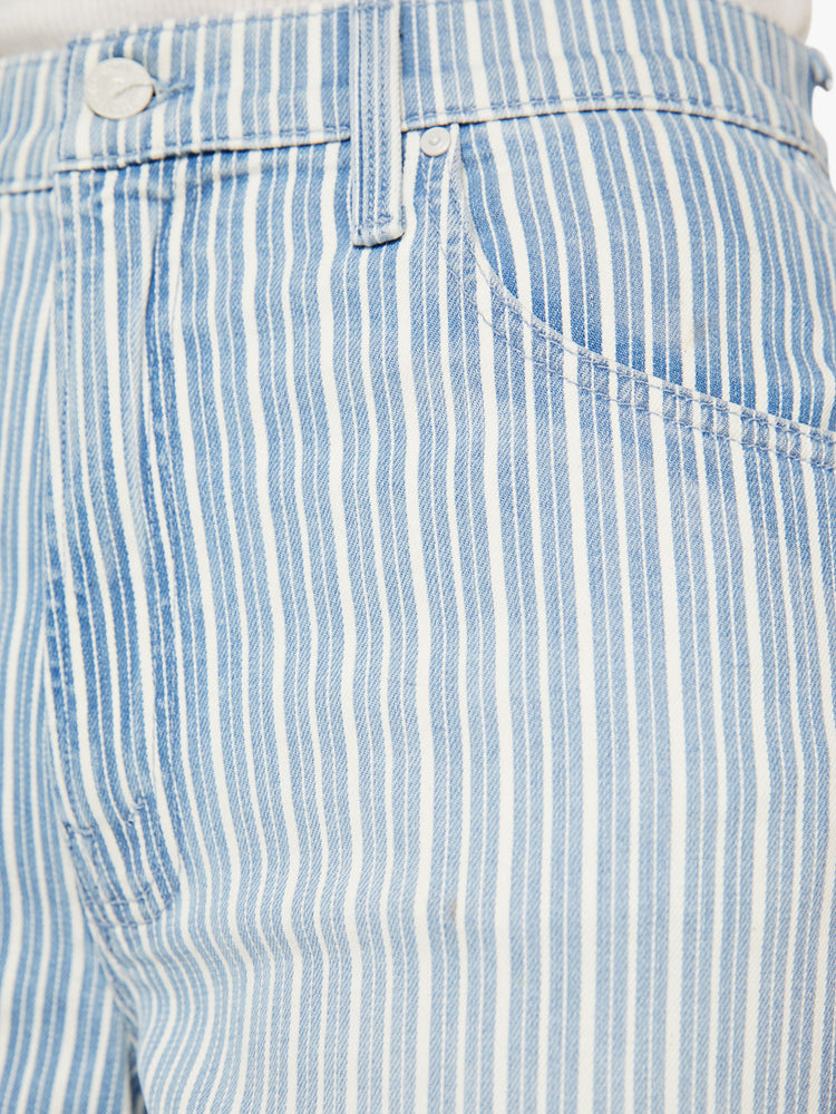 Swatch view of a woman super high rise jean with a loose wide leg, zip fly and a 31-inch inseam with a clean hem in a light blue and white striped denim.