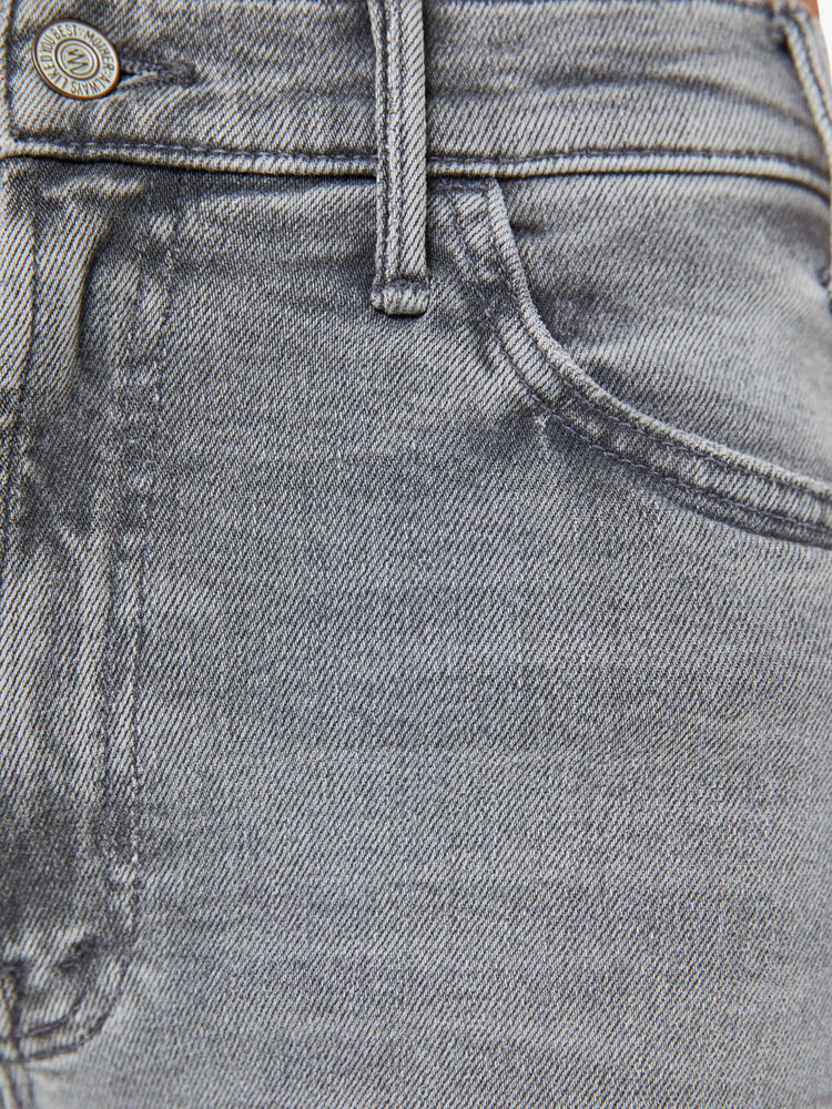 Swatch view of a woman in grey wide leg pants with a zip fly, high rise, 31-inch inseam and a clean hem.