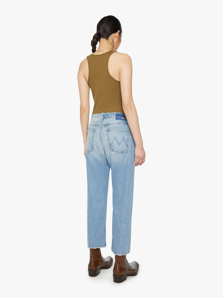 Back view of a woman Cropped jeans with a button fly, slouchy straight leg, 26-inch inseam and relaxed fit in a light blue wash.