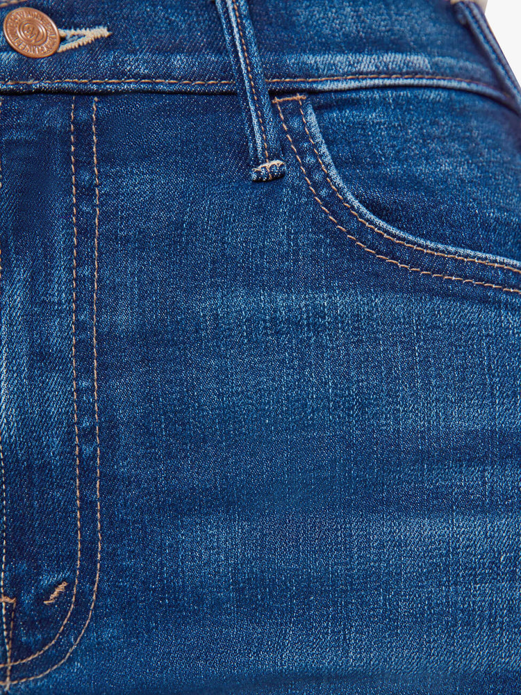 Swatch view of a woman in a wide leg jeans with a high rise, zip fly, 33.25-inch inseam and a clean hem.