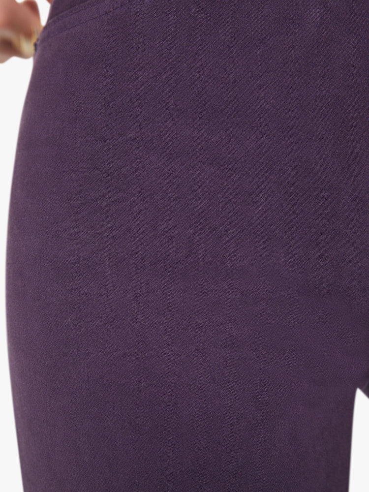 Swatch  view of a woman high-rise straight leg with an ankle-length inseam and a frayed hem in a blackberry-purple hue.