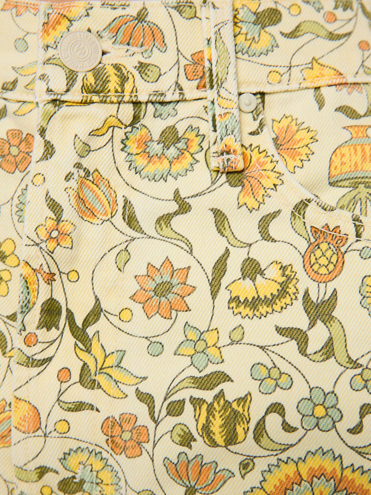 Swatch view of a woman in a pale yellow fresh florals  wide legs pant with a high rise with a slightly dropped crotch, zip fly, low-set back pockets and a 32-inch inseam with a clean hem.