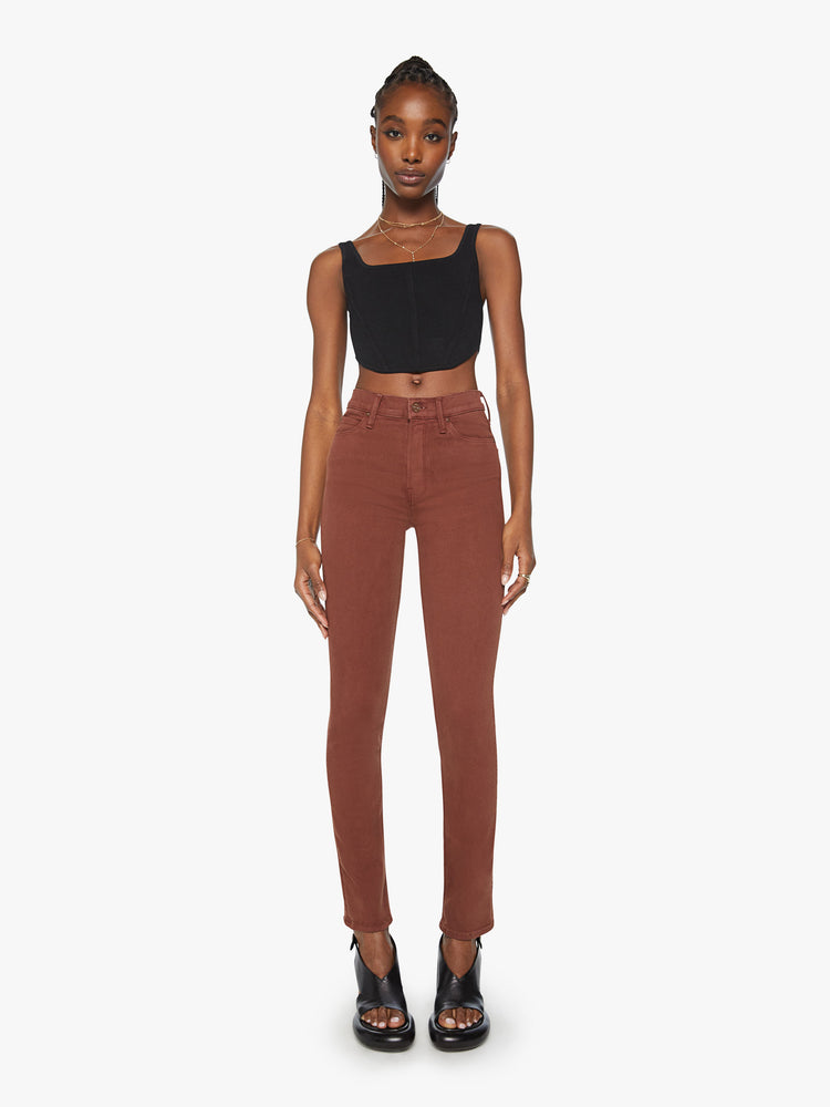 Front view of a woman mid-rise straight leg with a 31-inch inseam and a clean hem in a chocolate brown hue.