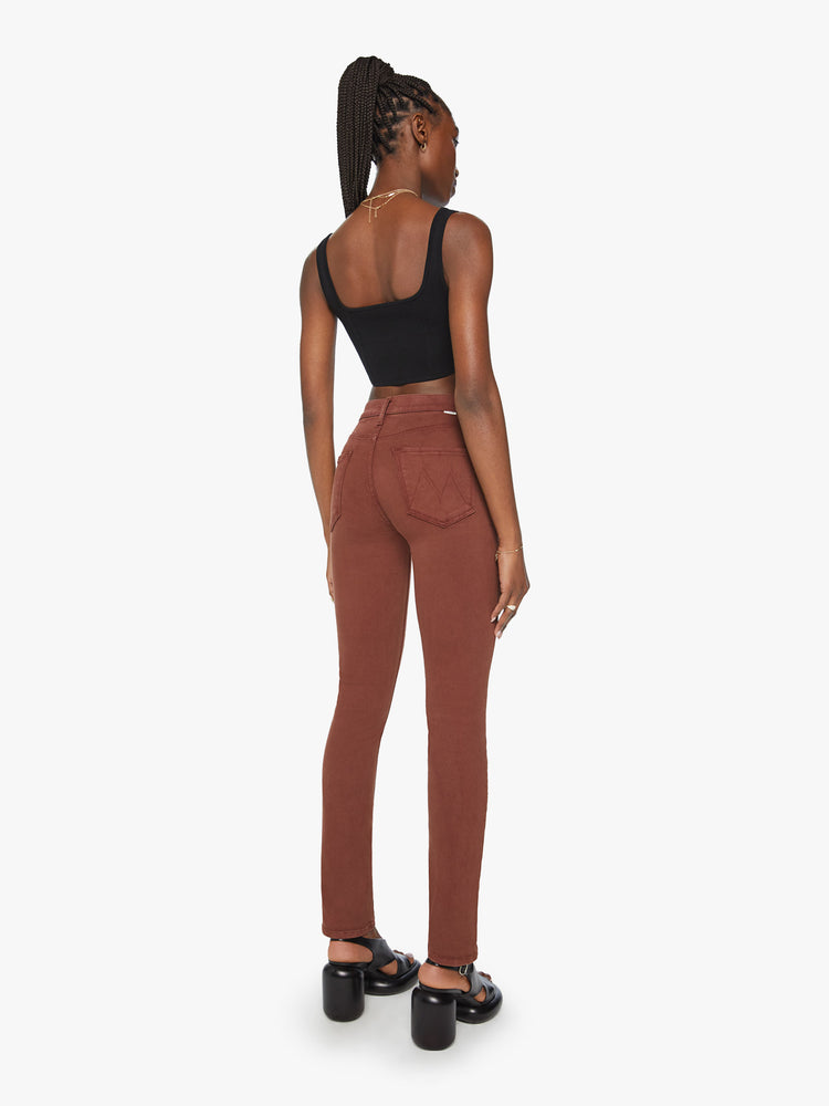 Back view of a woman mid-rise straight leg with a 31-inch inseam and a clean hem in a chocolate brown hue.