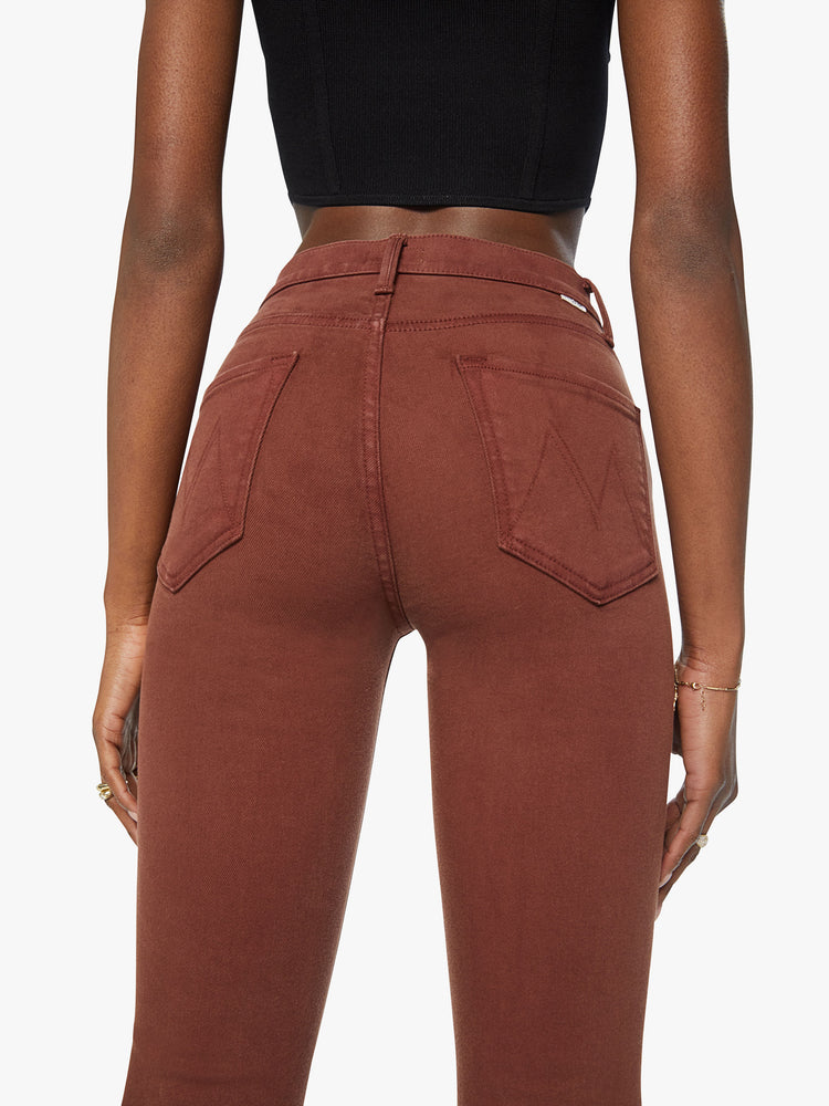 Waist back view of a woman mid-rise straight leg with a 31-inch inseam and a clean hem in a chocolate brown hue.