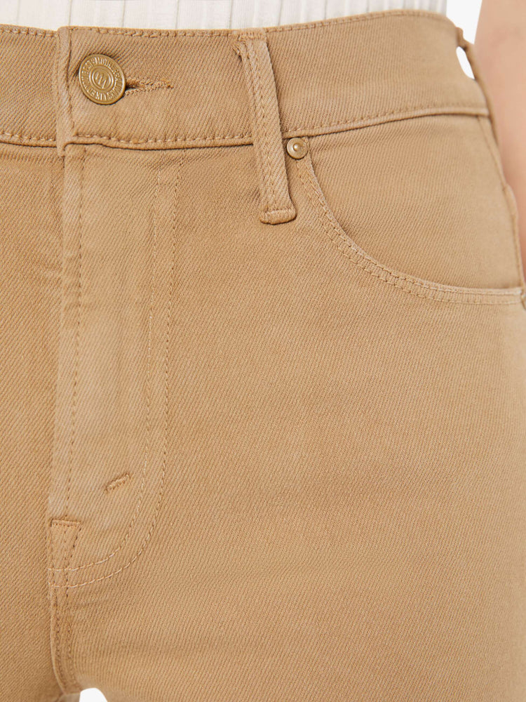 Close up swatch detail view of a brown pant.