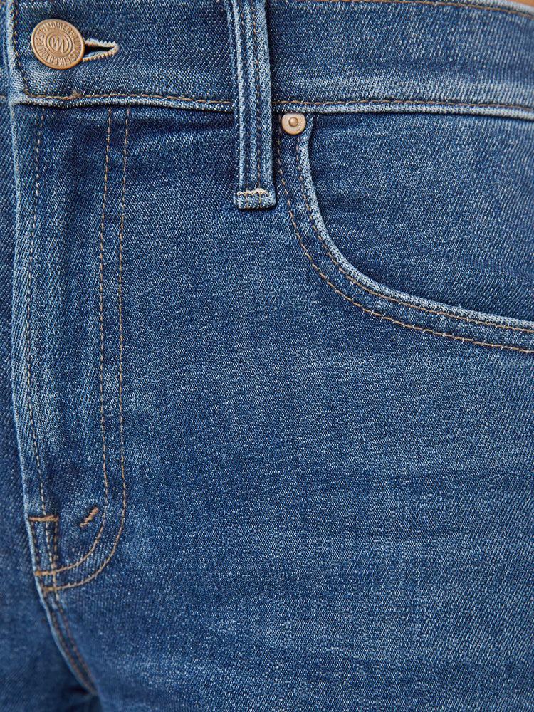 Swatch view of a mid blue mid-rise jeans with a wide straight leg, zip fly and clean ankle-length inseam.