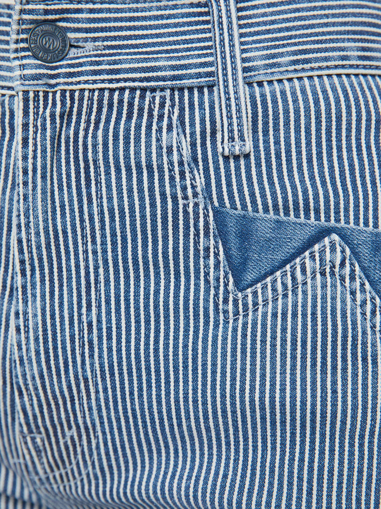 Swatch view of a woman in a midblue with white vertical stripes with high-rise jeans with a straight leg, zip fly, diamond cut-out details, an ankle-length inseam and a clean hem.
