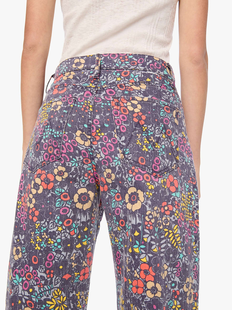 Back close up view of a woman in floral print super high-waisted pant with a wide, curved leg, zip fly, 28.25-inch inseam and a clean hem.