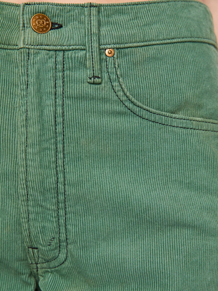 Swatch view of a woman in wide leg corduroy designed to sit on the hips with a slouchy fit, these high-rise pants have a zip fly, a loose wide leg with a curved outer seam and a 32-inch inseam with a clean hem.
