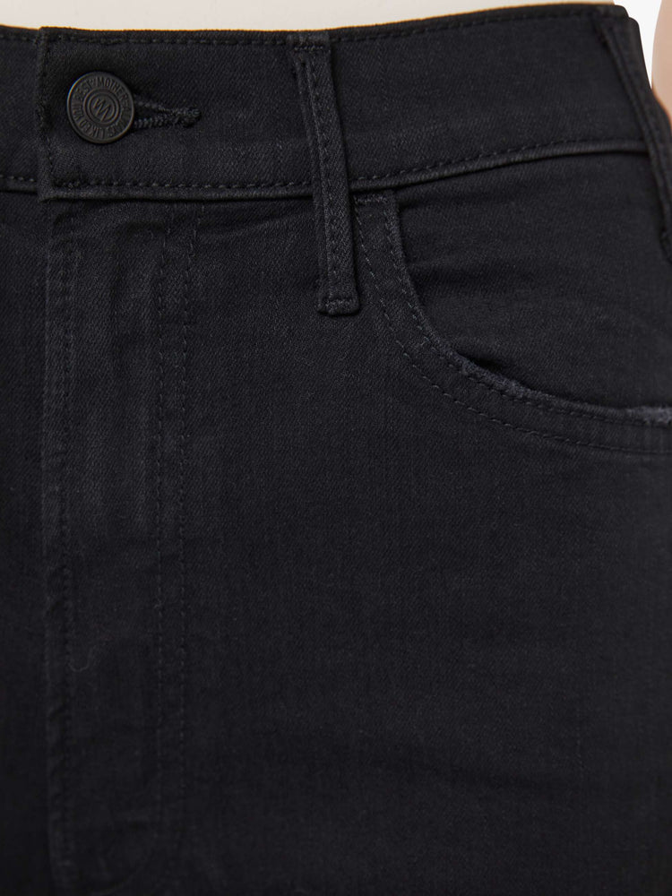 Close up view of a black jean.