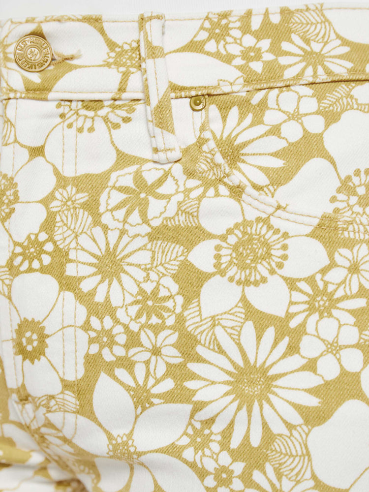 Swatch view of a woman in a off white with golden yellow floral print high-waisted pants with a skinny leg, zip fly and a capri-length inseam.