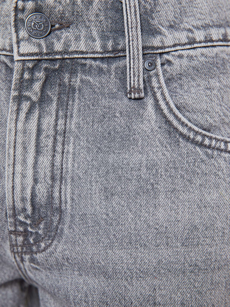 Swatch view of a woman in a grey  lower-rise jeans have a zip fly, narrow straight-leg and a long 34-inch inseam with a clean hem. 