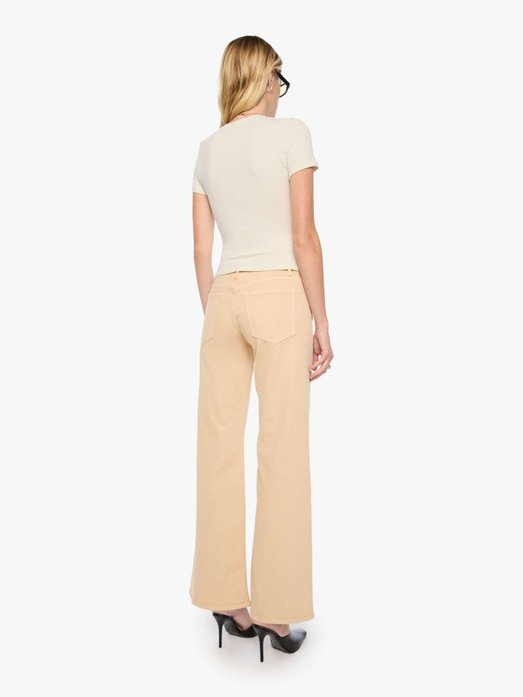 Back view of a woman in a soft khaki mid-rise wide leg with a zip fly, 32-inch inseam and a clean hem.