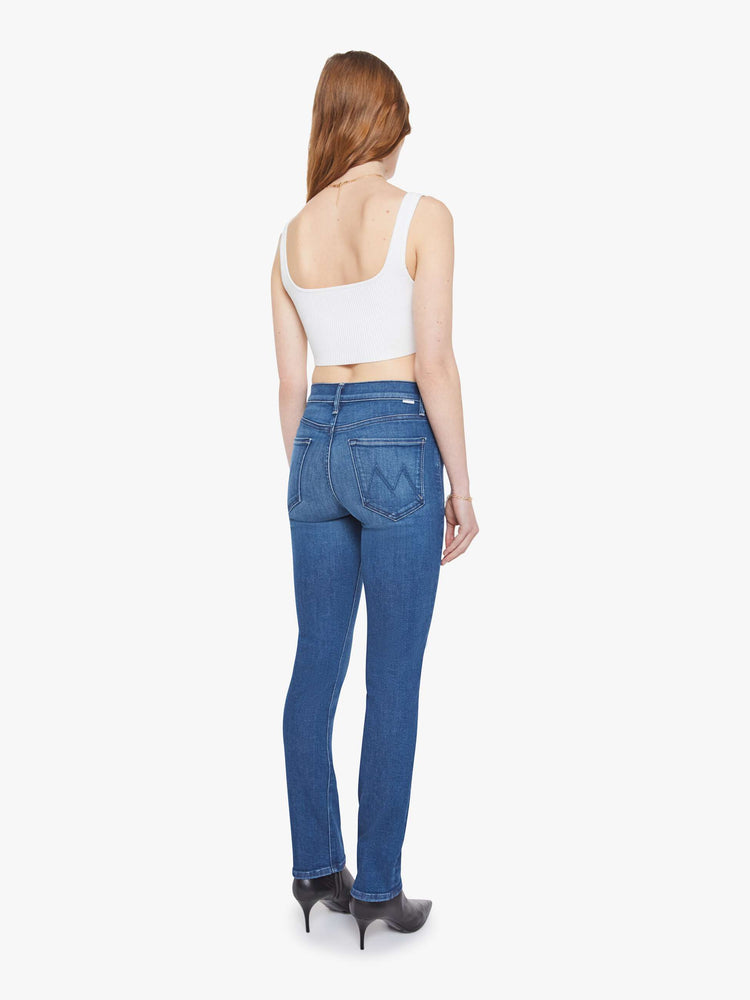 Back mid-rise jean has a straight leg, zip fly, 29-inch inseam and a clean hem.