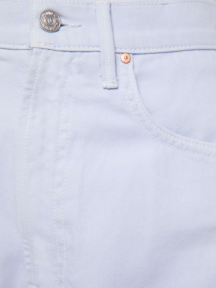 Swatch view of a woman in a washed light blue super high-waisted barrel-leg jeans with a long 32-inch inseam, zip fly, clean hem and relaxed fit.