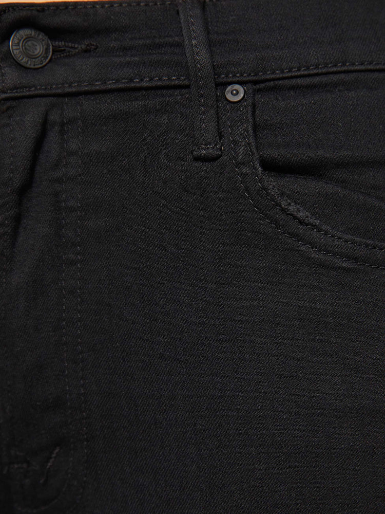 Swatch view of women’s black cropped bootcut jean with a step frayed hem.