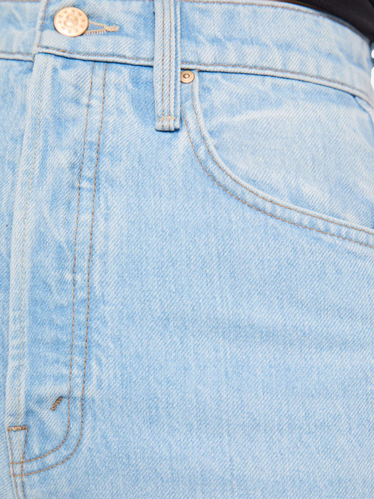 Swatch view of a woman in a light blue  super high-waisted pants have a button fly, slightly tapered straight leg, a long 32-inch inseam and a clean hem. 