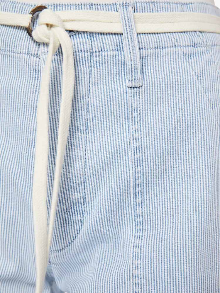 Swatch  view of a woman in a light blue with white vertical stripes high-waisted jeans with a loose wide leg, utility-inspired patch pockets, a button fly, 30-inch inseam and a clean hem.