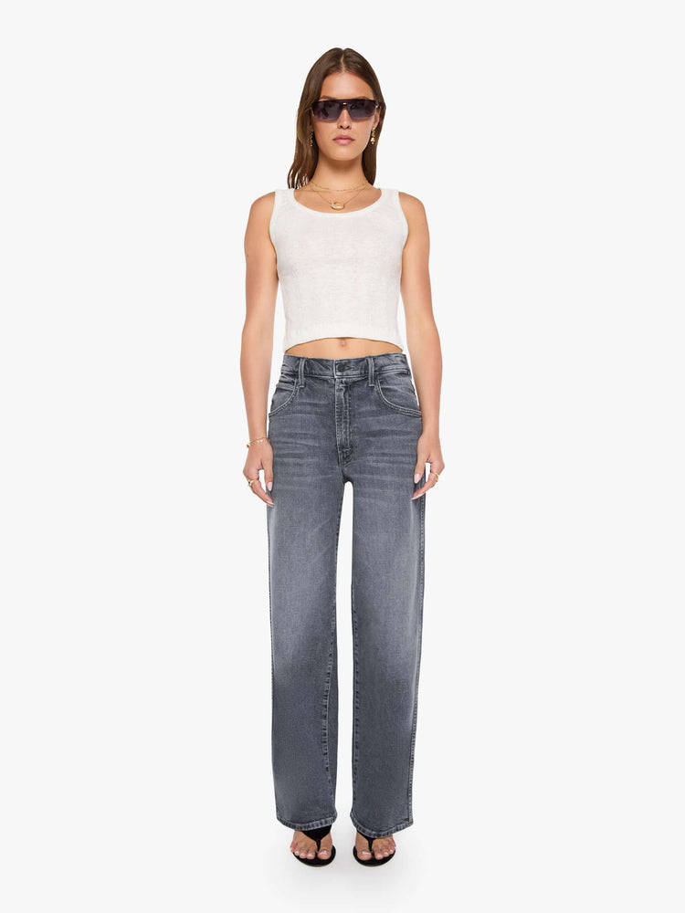 Front view of a grey washed jeans designed to sit lower on the hips with a zip fly, slightly tapered leg and a 31-inch inseam with a clean hem.