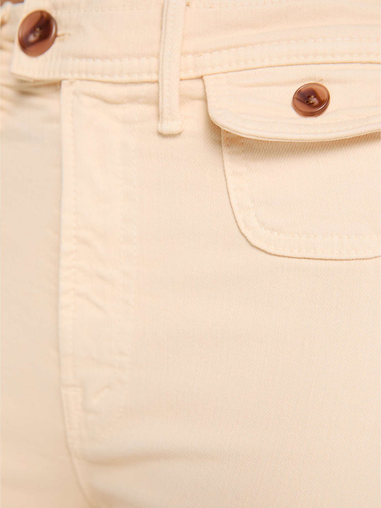 Swatch view of a peachy khaki wide leg jeans with a high rise, zip fly, button-tab waistband, miniature patch pockets, a 32-inch inseam and a clean hem.