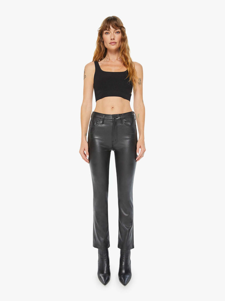 Front view of women’s faux leather ankle length bootcut pant.