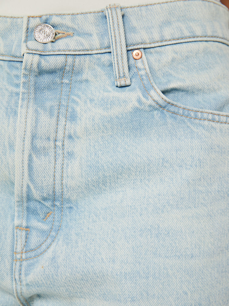 Swatch view of a woman cropped jeans with a button fly, slouchy straight leg and relaxed fit in a light blue wash.