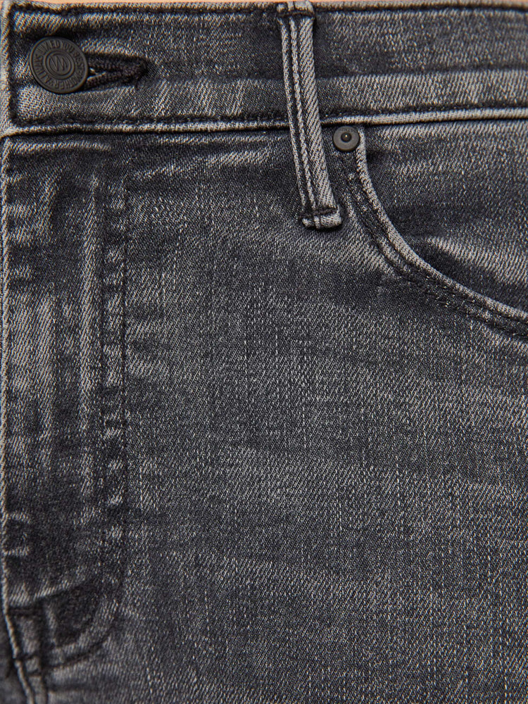 Swatch view of women's gray mid rise flare jean with zip fly and frayed hems.